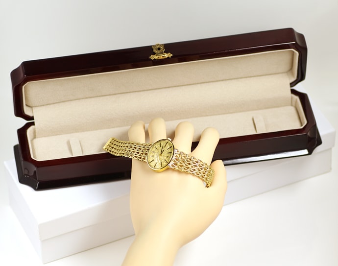 Foto 4 - Tissot Damen-Armbanduhr oval in 585er Gelbgold, U2613